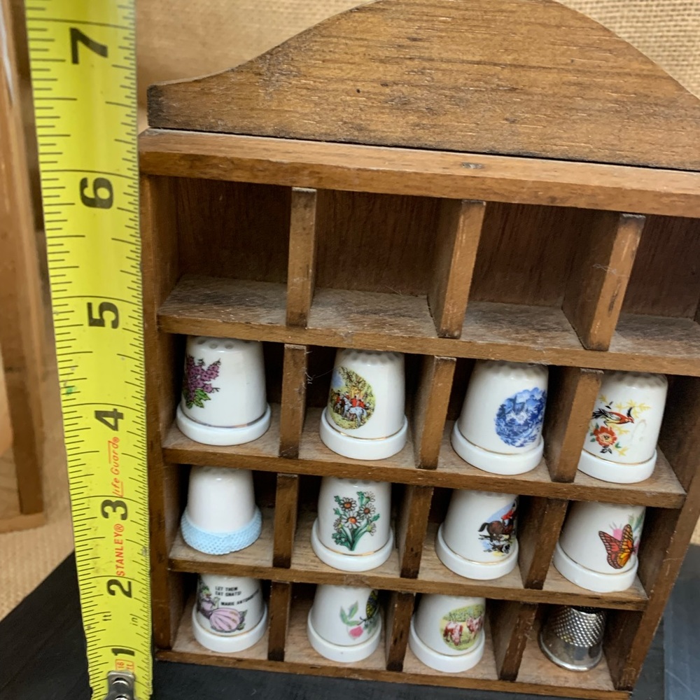Vintage thimbles in wood box